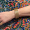 Bracelet Bracelet manchette souple tressé en or jaune 18K 58 Facettes REF2366-88