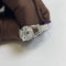 Bague 53 Cartier Panthère - Bague en or gris, diamants, émeraudes et onyx 58 Facettes jnci105