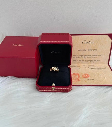 Bague 54 Cartier Panthère - Bague en or jaune, diamants, grenats et onyx 58 Facettes jnci103