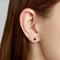 Boucles d'oreilles Single Tulip - Boucles d'oreilles en or blanc 18 ct, rubis et diamants 58 Facettes GER1337RB