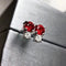 Boucles d'oreilles Single Tulip - Boucles d'oreilles en or blanc 18 ct, rubis et diamants 58 Facettes GER1337RB