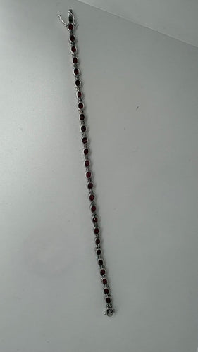 Bracelet Bracelet rivière en or blanc, rubis et diamants 58 Facettes Bracelet 001