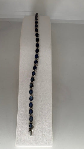 Bracelet Bracelet rivière en or blanc, saphirs et diamants 58 Facettes Bracelet 001