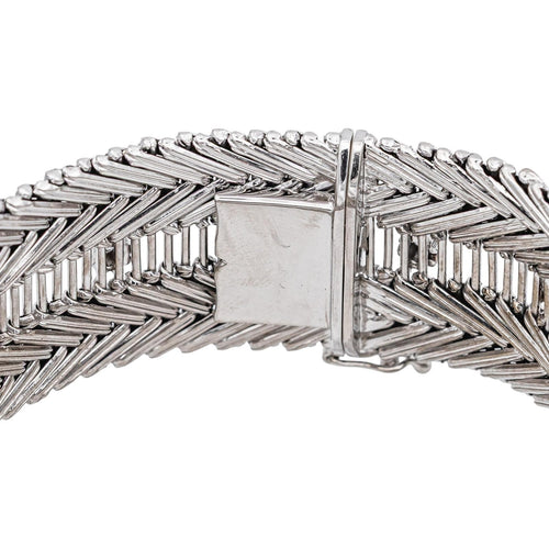 Bracelet Bracelet manchette en or blanc et diamants 58 Facettes 5237102CN