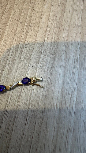 Bracelet Bracelet en deux ors 18 carats et améthystes 58 Facettes Bracelet 001