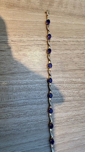 Bracelet Bracelet en deux ors 18 carats et améthystes 58 Facettes Bracelet 001
