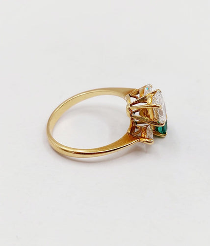 Bague 47 Bague toi et moi en or 18k, diamant, émeraude et diamants 58 Facettes A07434