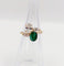 Bague 47 Bague toi et moi en or 18k, diamant, émeraude et diamants 58 Facettes A07434