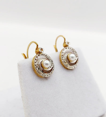 Boucles d'oreilles Dormeuses tourbillon en or 18K, perles et diamants taille rose 58 Facettes A06494