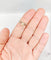 Bague 54 Bague trèfle antique en or rose, platine, perles et diamants 58 Facettes A06880