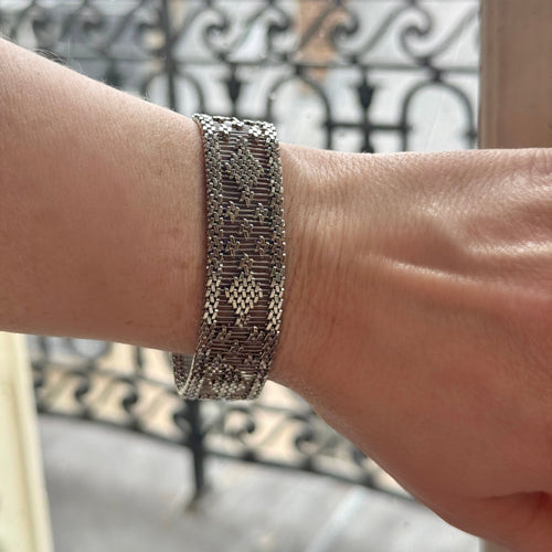 Bracelet Bracelet manchette tissé en or gris 58 Facettes REF24086-249