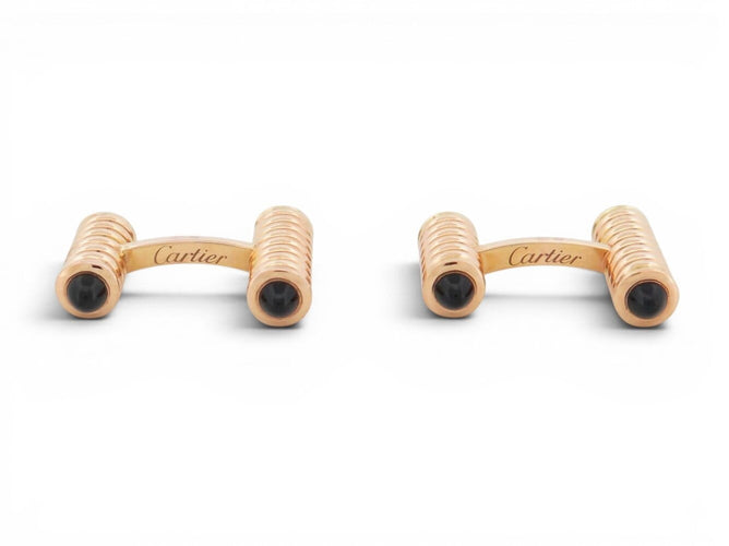 Boutons de manchette Cartier Décors Ressorts - Boutons de manchette en or rose et onyx 58 Facettes 274667