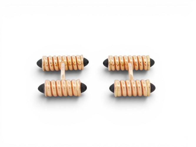 Boutons de manchette Cartier Décors Ressorts - Boutons de manchette en or rose et onyx 58 Facettes 274667