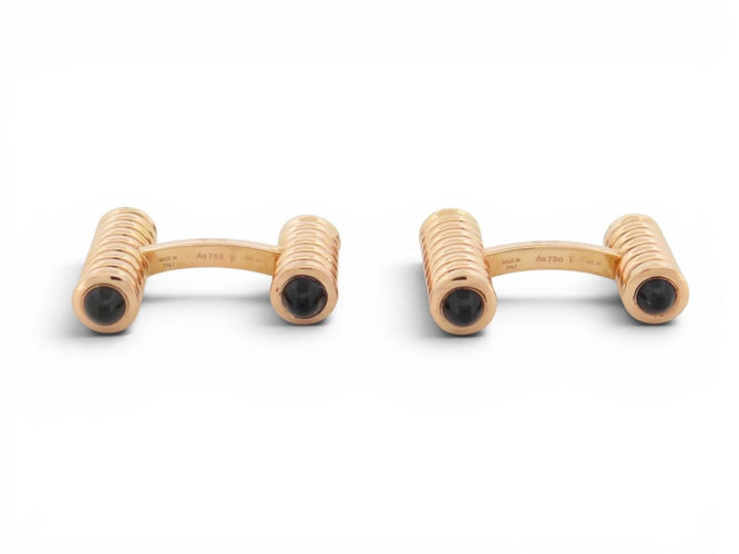 Boutons de manchette Cartier Décors Ressorts - Boutons de manchette en or rose et onyx 58 Facettes 274667