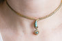 Collier Collier victorien en or jaune, turquoises et grenats 58 Facettes 11623