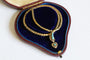 Collier Collier victorien en or jaune, turquoises et grenats 58 Facettes 11623