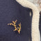 Broche Broche oiseau dans un cerisier en or jaune 18K, rubis 58 Facettes REF2503-270