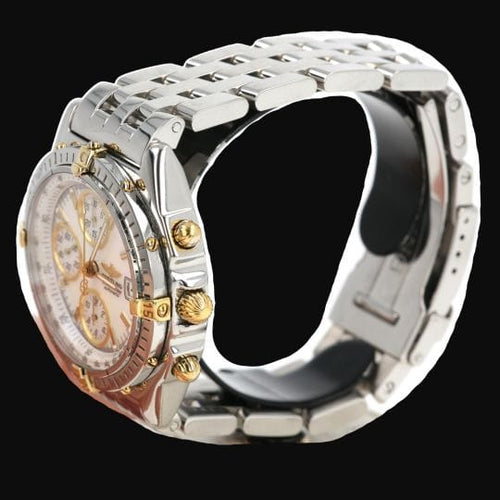 Montre Breitling Chronomat - Montre chronographe en or jaune et acier 58 Facettes MT46201