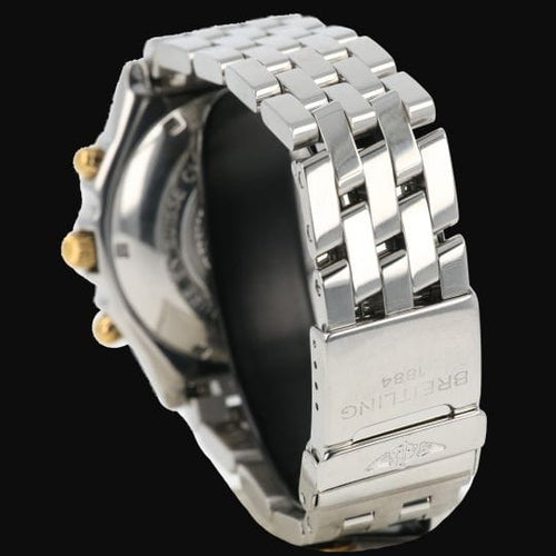 Montre Breitling Chronomat - Montre chronographe en or jaune et acier 58 Facettes MT46201
