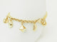 Bracelet Bracelet breloques en or jaune 18 carats et perles 58 Facettes 33799