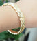 Bracelet Bracelet jonc torsadé en or jaune 58 Facettes 33800