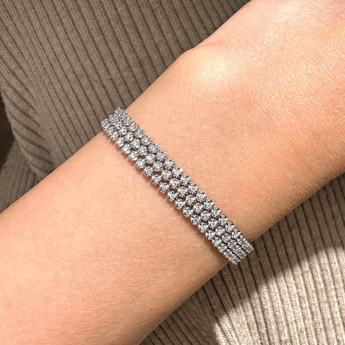 Bracelet Disco - Bracelet tennis triple en or blanc et diamants 58 Facettes GBT1018WG-1