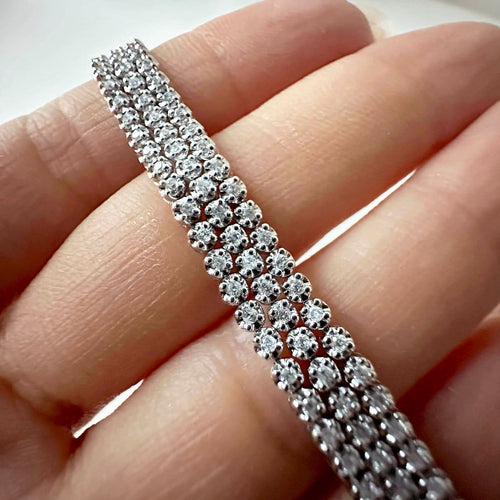 Bracelet Disco - Bracelet tennis triple en or blanc et diamants 58 Facettes GBT1018WG-1