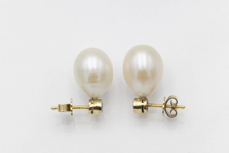 Boucles d'oreilles Boucles d'oreilles puces en or 14 carats, diamants et perles 58 Facettes 12398