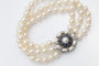 Bracelet Bracelet de perles avec fermoir en or blanc et saphirs 58 Facettes 12376