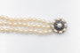 Bracelet Bracelet de perles avec fermoir en or blanc et saphirs 58 Facettes 12376