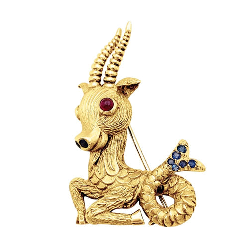 Boucles d'oreilles Capricorne - Broche-clip en or jaune, rubis et saphirs 58 Facettes 35785