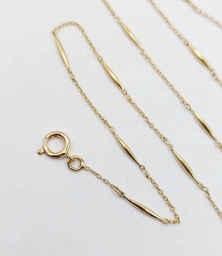 Collier Collier chaîne vintage en or 18K à mailles forçat 58 Facettes A07405