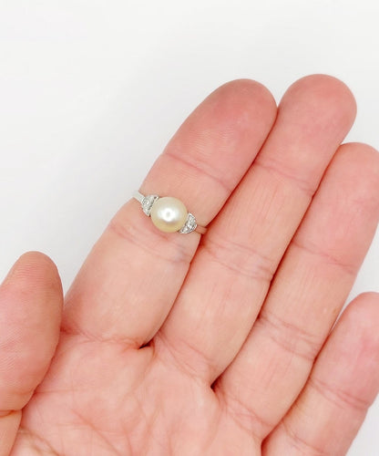 Bague 54.5 Bague Art déco en or blanc, platine, perle et diamants 58 Facettes A07356