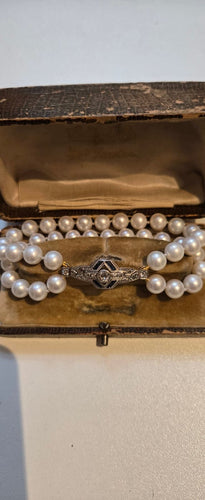 Bracelet Art déco - Bracelet en or 18 ct, platine, saphirs, diamants et perles 58 Facettes 1