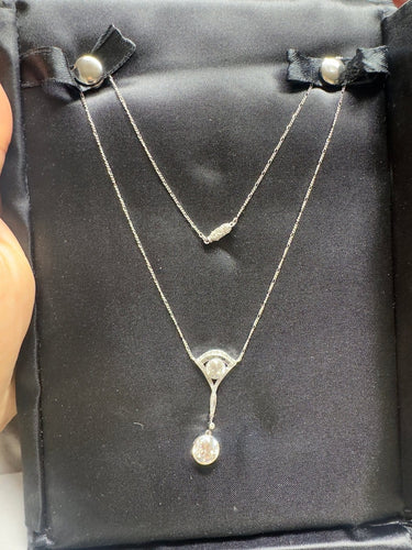 Collier Van Cleef & Arpels - Collier Négligée Art déco en platine, diamants et onyx 58 Facettes D17
