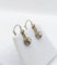 Boucles d'oreilles Boucles d'oreilles dormeuses antiques en or blanc et diamants 58 Facettes A07375