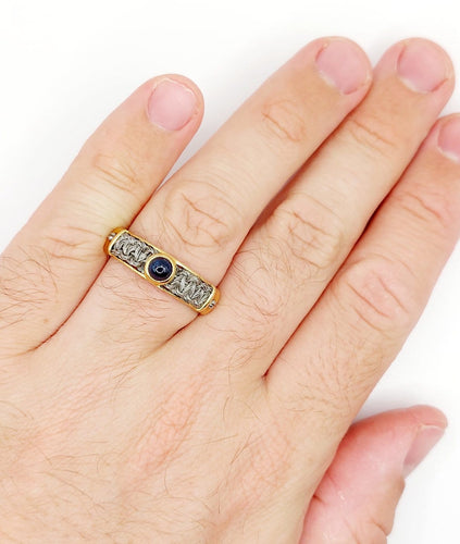 Bague 64 Bague chevalière vintage en or 18k, acier et saphir 58 Facettes A07432
