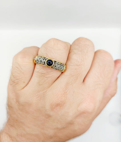 Bague 64 Bague chevalière vintage en or 18k, acier et saphir 58 Facettes A07432
