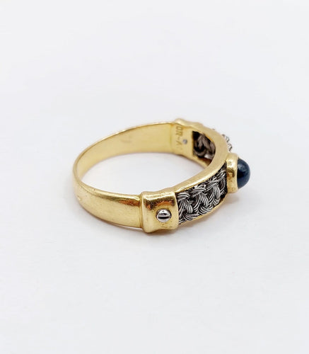 Bague 64 Bague chevalière vintage en or 18k, acier et saphir 58 Facettes A07432