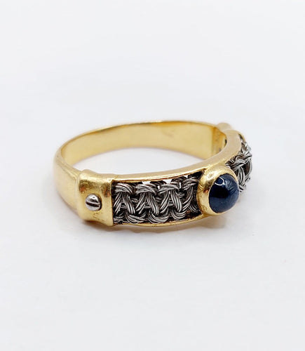 Bague 64 Bague chevalière vintage en or 18k, acier et saphir 58 Facettes A07432