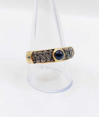 Bague 64 Bague chevalière vintage en or 18k, acier et saphir 58 Facettes A07432