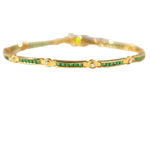 Bracelet tennis en or jaune avec émeraudes et diamants