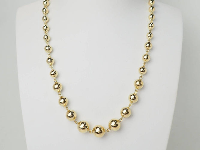 Collier Collier marseillais - Collier boules en chute en or jaune 58 Facettes 33480