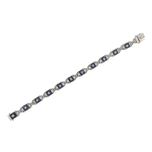 Bracelet Bracelet en or blanc avec diamants et saphirs 58 Facettes G3979