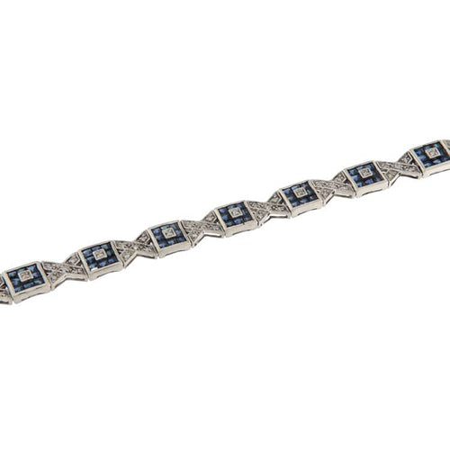 Bracelet Bracelet en or blanc avec diamants et saphirs 58 Facettes G3979