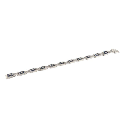 Bracelet Bracelet en or blanc avec diamants et saphirs 58 Facettes G3979