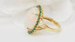 Bague Bague ovale en or jaune, opale cabochon et émeraudes 58 Facettes 32639