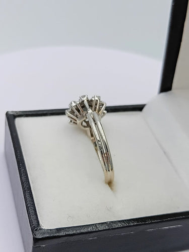 55 Bague fleur en or gris, platine et diamants 58 Facettes SADD/51/0