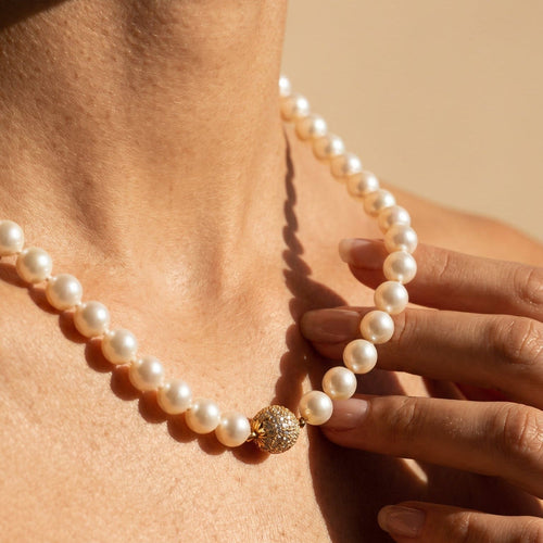 Collier Collier de perles de culture en or jaune 14 carats et diamants 58 Facettes HJ062613