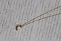 Collier Collier demi-lune en or rose 18K et diamants 58 Facettes